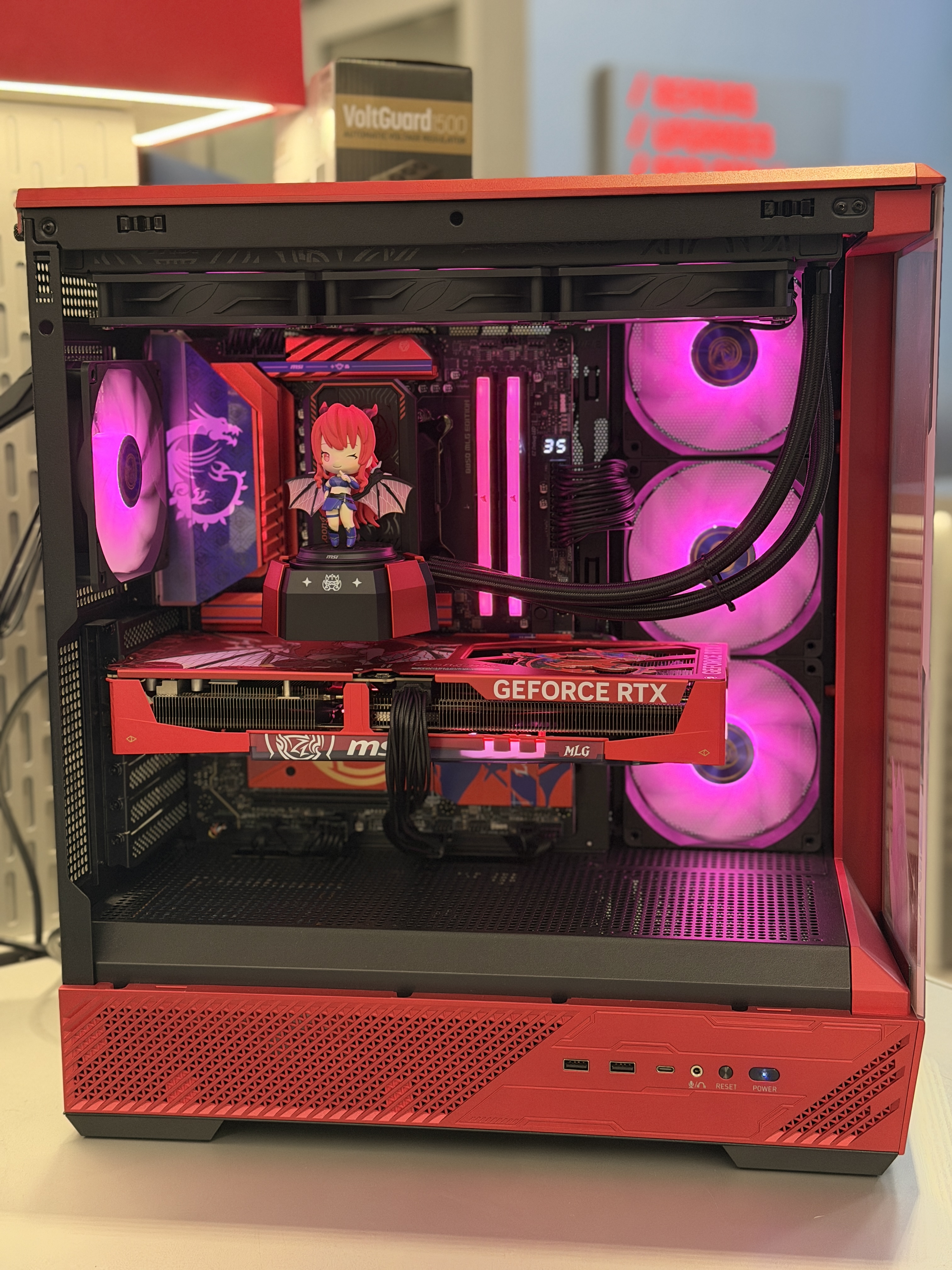 Full interior view of a custom red gaming PC with GeForce RTX graphics card